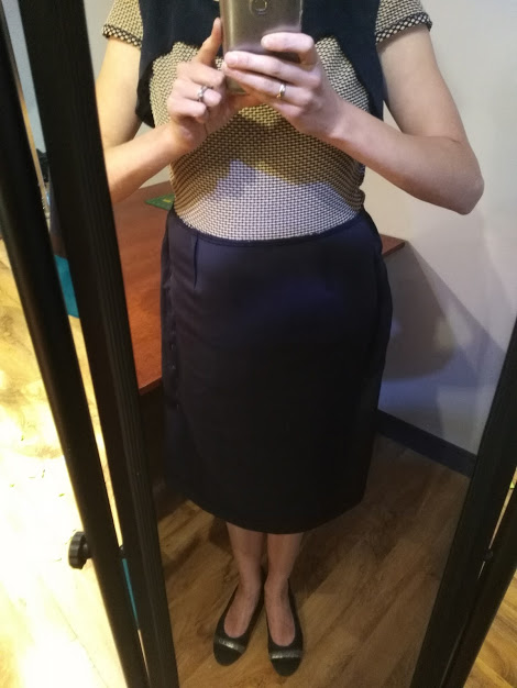 pinned in skirt