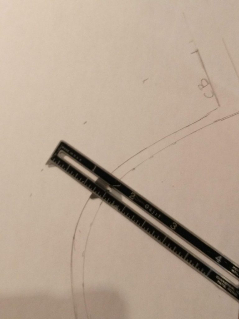 draw in neckline facing using seam gage