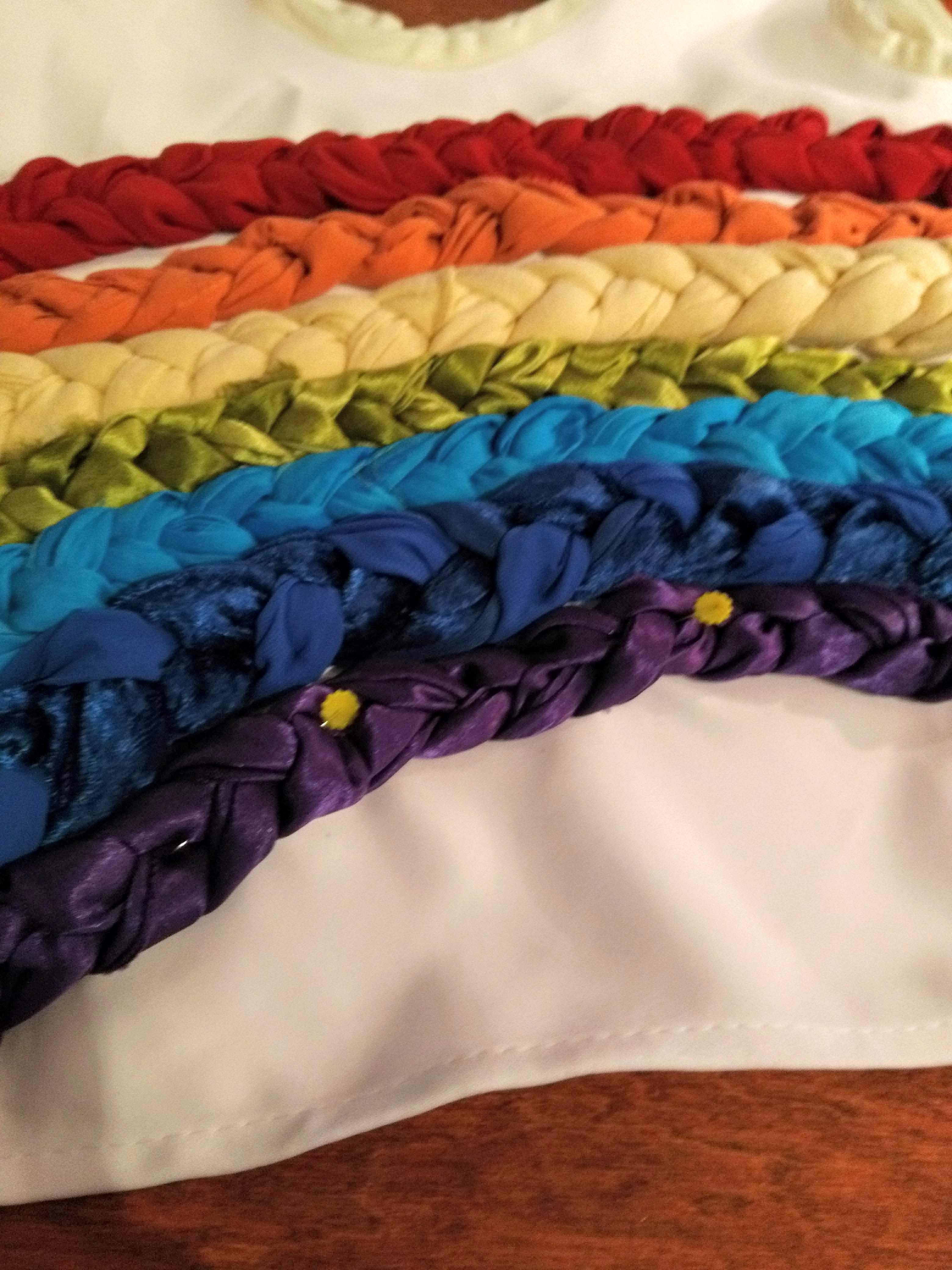 Pin colours on DIY rainbow costume
