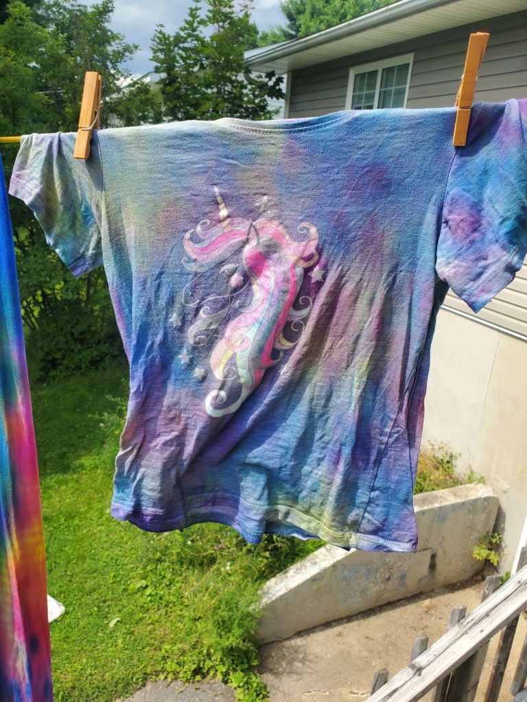silkscreened shirt spray dye line drying
