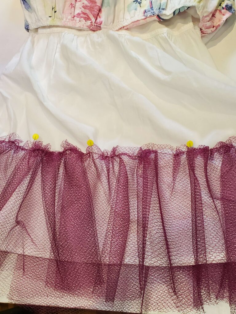 Pin tulle tiers to skirt